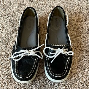 Sperry Black with black and white dots design on sides and tongue. Size 8M